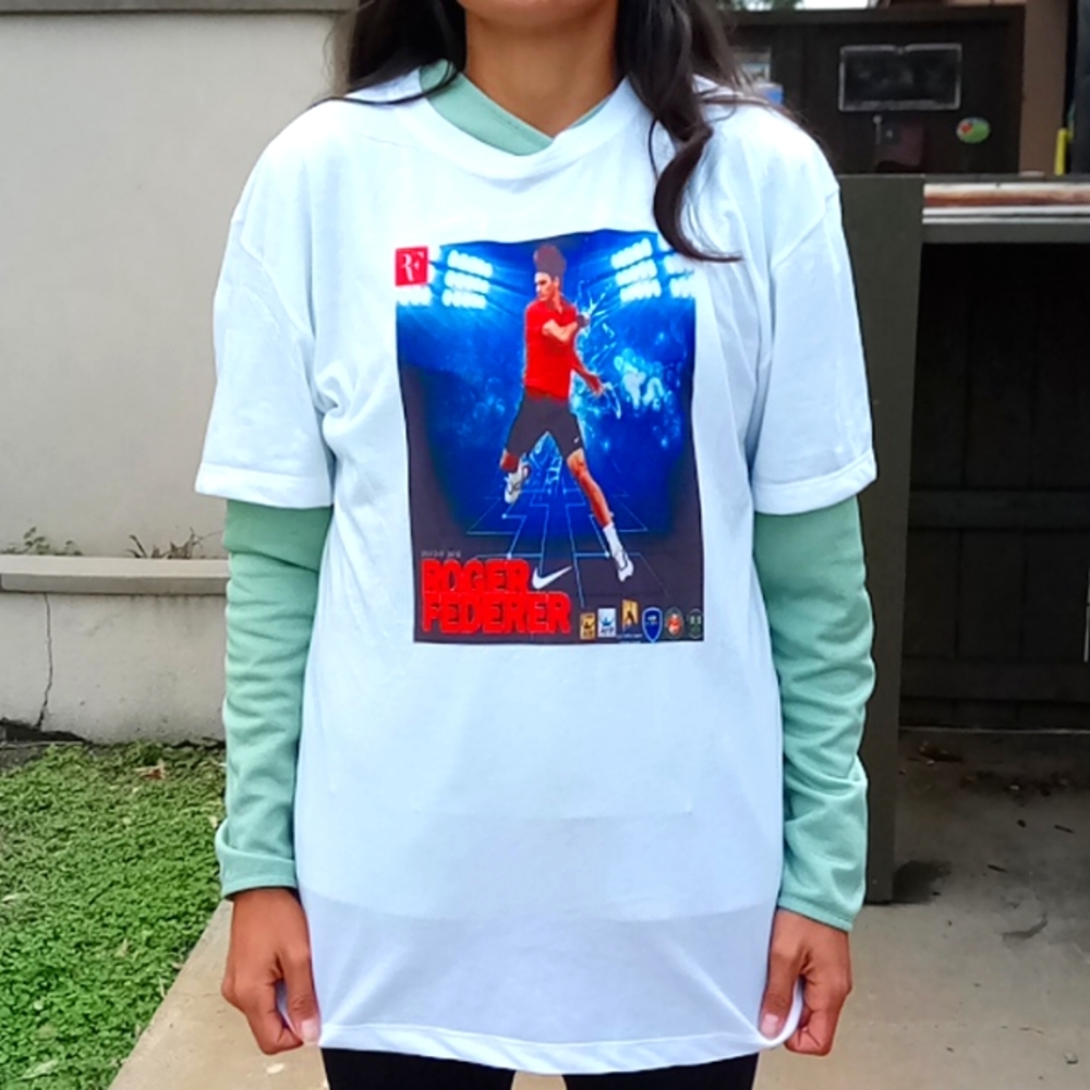 Brand new one of a kind Roger Federer polyester - dri-fit tee.  Unique